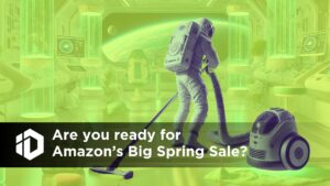 A futuristic astronaut in a high-tech space station is vacuuming the floor with a robotic vacuum cleaner nearby. The scene is bathed in a neon green overlay. A bold black banner with white text reads, "Are you ready for Amazon’s Big Spring Sale?" on the lower section of the image, accompanied by a geometric logo on the left. The background features a sleek, advanced space station with glowing blue-green cylindrical structures, floating shelves, and a view of a planet through the window.