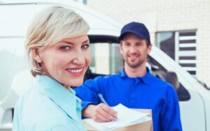 Amazon Prime Day customer receiving box from delivery person, high-income, suburban female aged 35-44