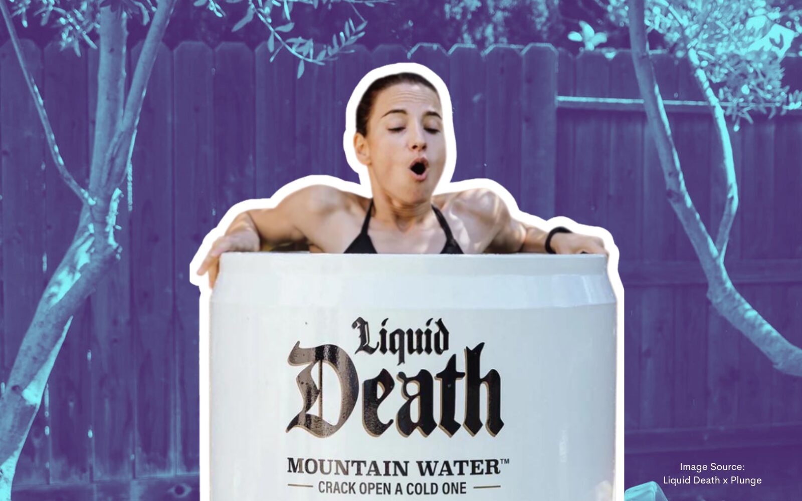 Woman trying the new Freeze to Death cold plunge tub, a cobranding collaboration between Liquid Death and Plunge Cold Tubs.