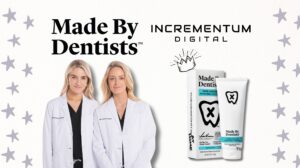 Dr. Lisa Creaven and Dr. Vanessa Creaven, co-founders of Made By Dentists, stand side by side in white coats next to their brand’s toothpaste packaging. The image features the Made By Dentists and Incrementum Digital logos, with star accents and a crown illustration in the background.